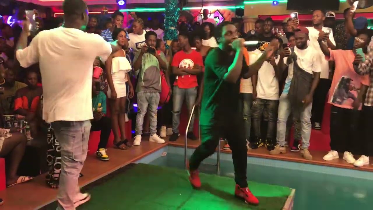 Kweku Smoke , smoking 🚬 to his fans as he was ready to perform in NK City Takoradi