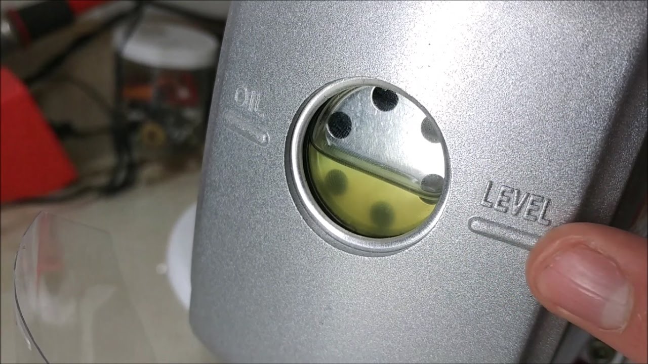 Changing The oil on a Vacuum Pump 101.