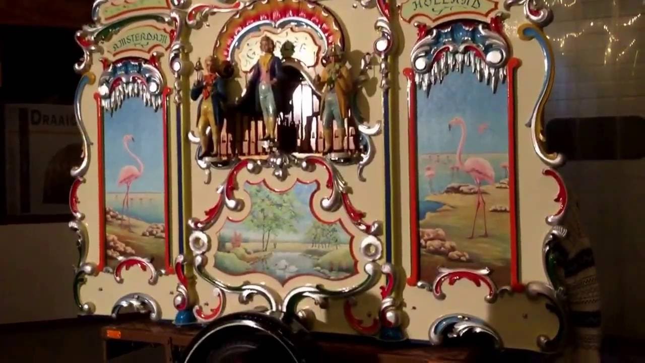Draaiorgel de flamingo perlee speelt niemand laat zijn eigen kind alleen  draaier Robin