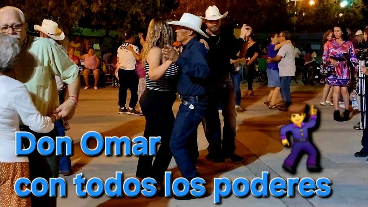 Don Omar baila con alguien que llego al parque