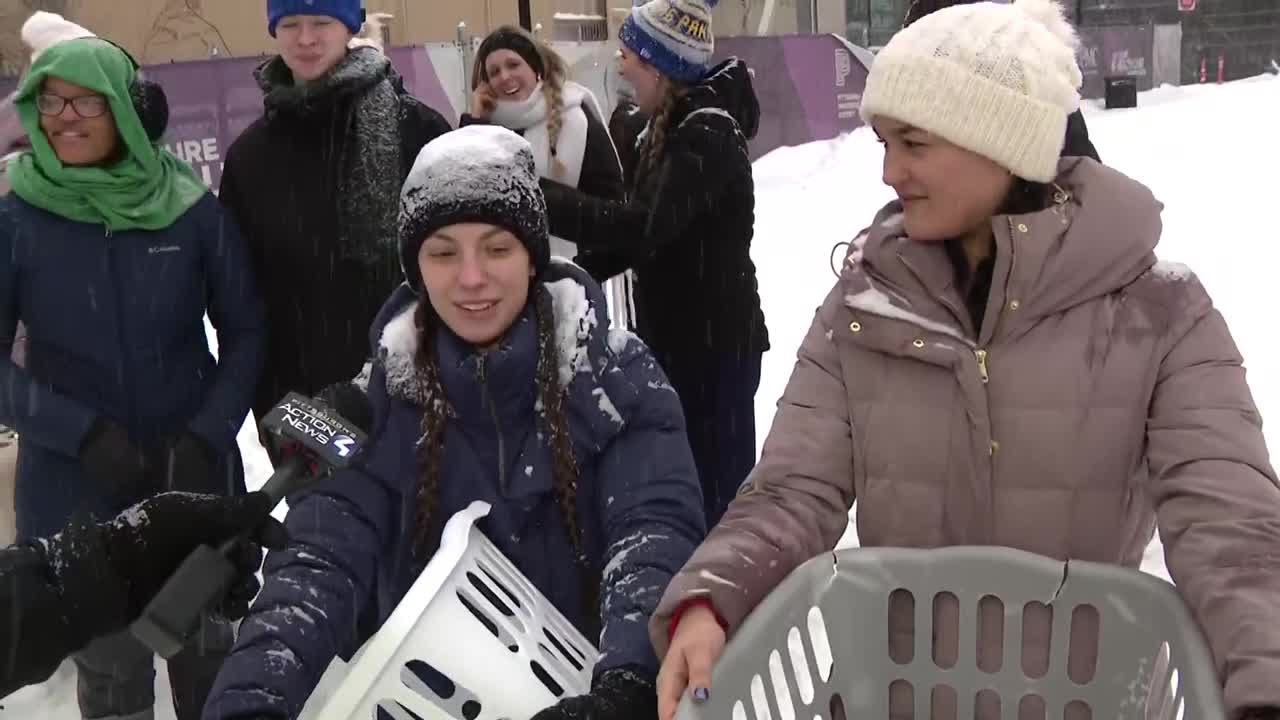 Snow day fun in Pittsburgh: Laundry baskets and snowboards
