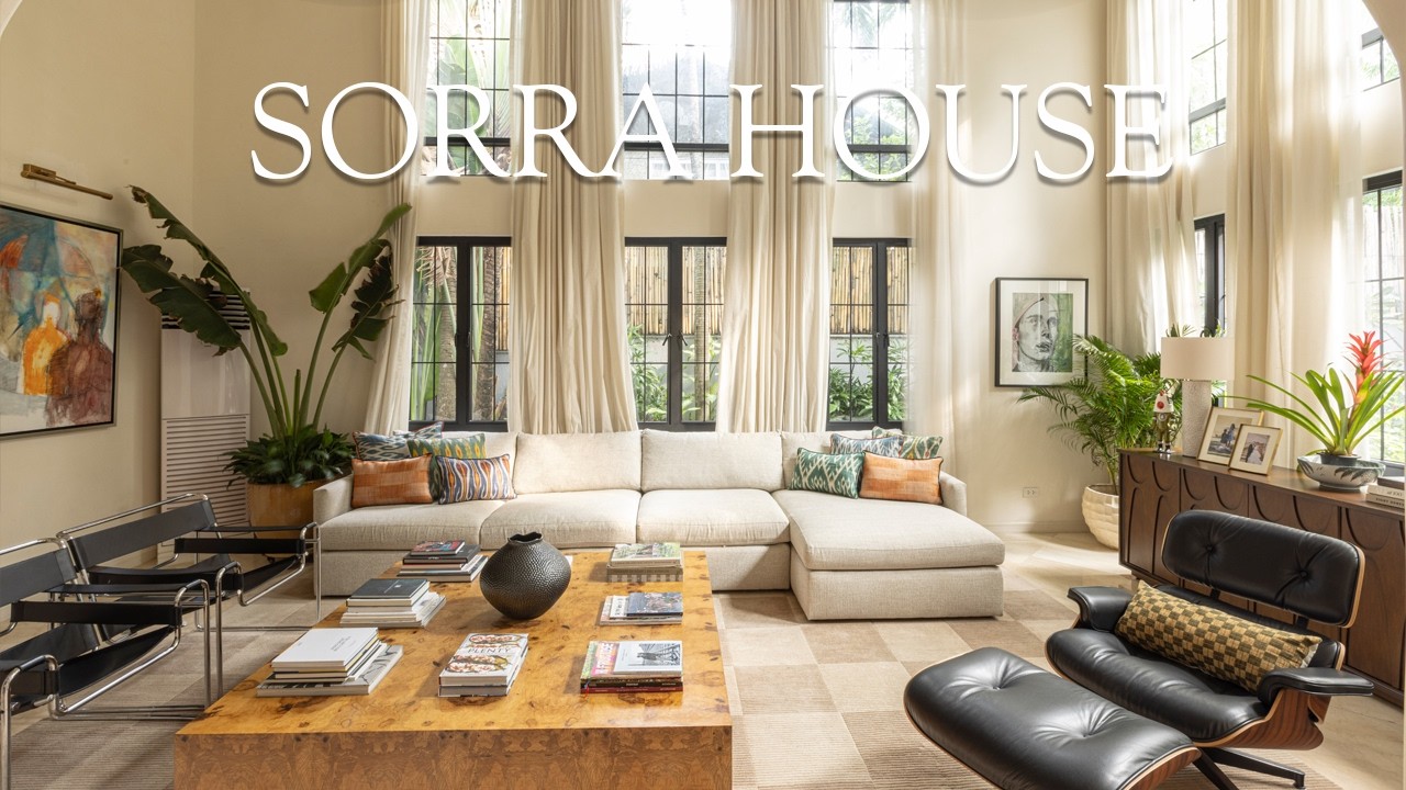Luxurious arches and a double height ceiling are defining features of this home