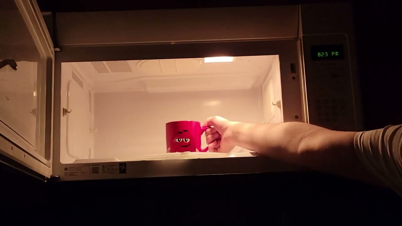 Ambient Microwave hot water, night time  Spot lighted (Moving lights warning.)