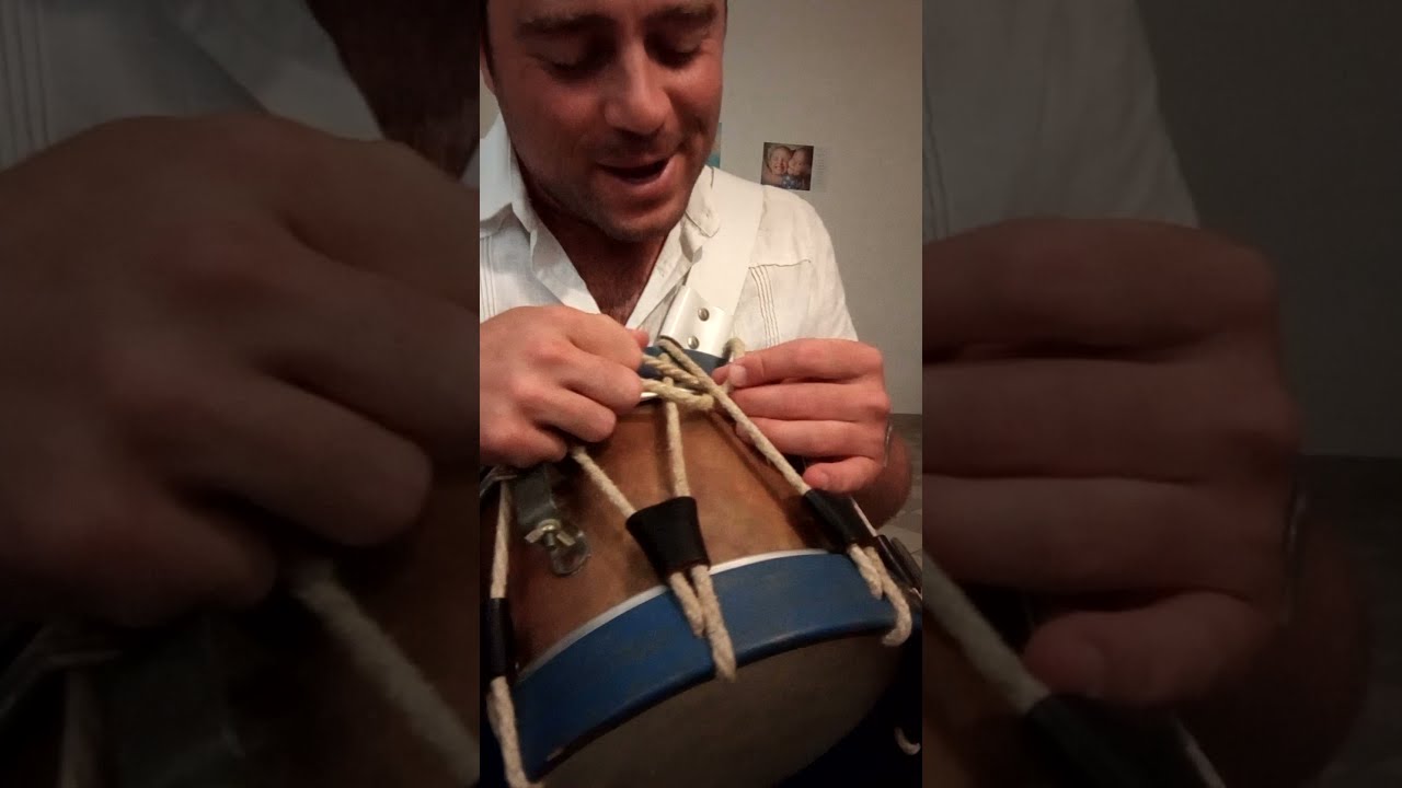 tendre la corde d'un tambour d'ordonnance
