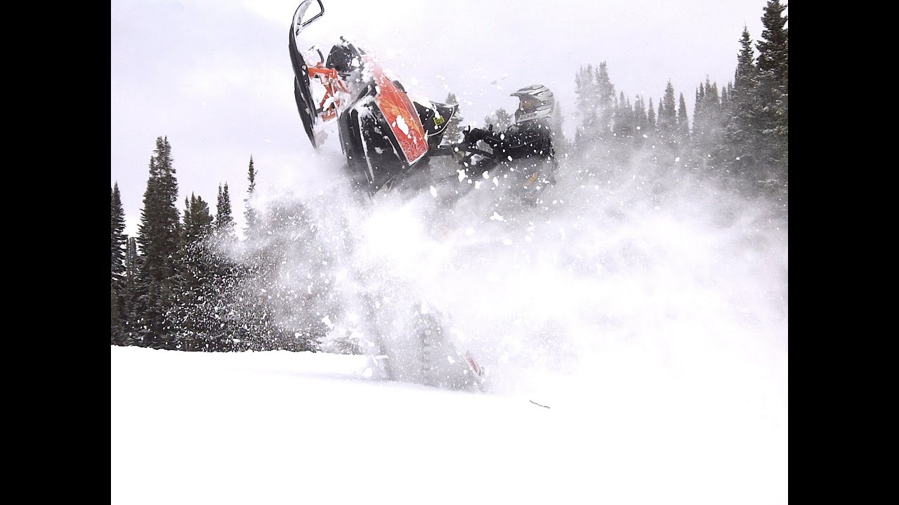 EXTREME VERTICAL Steep Snowmobile Hill Climb thru Chute Jagged Rock Cliffs M8 Arctic Cat Turbo