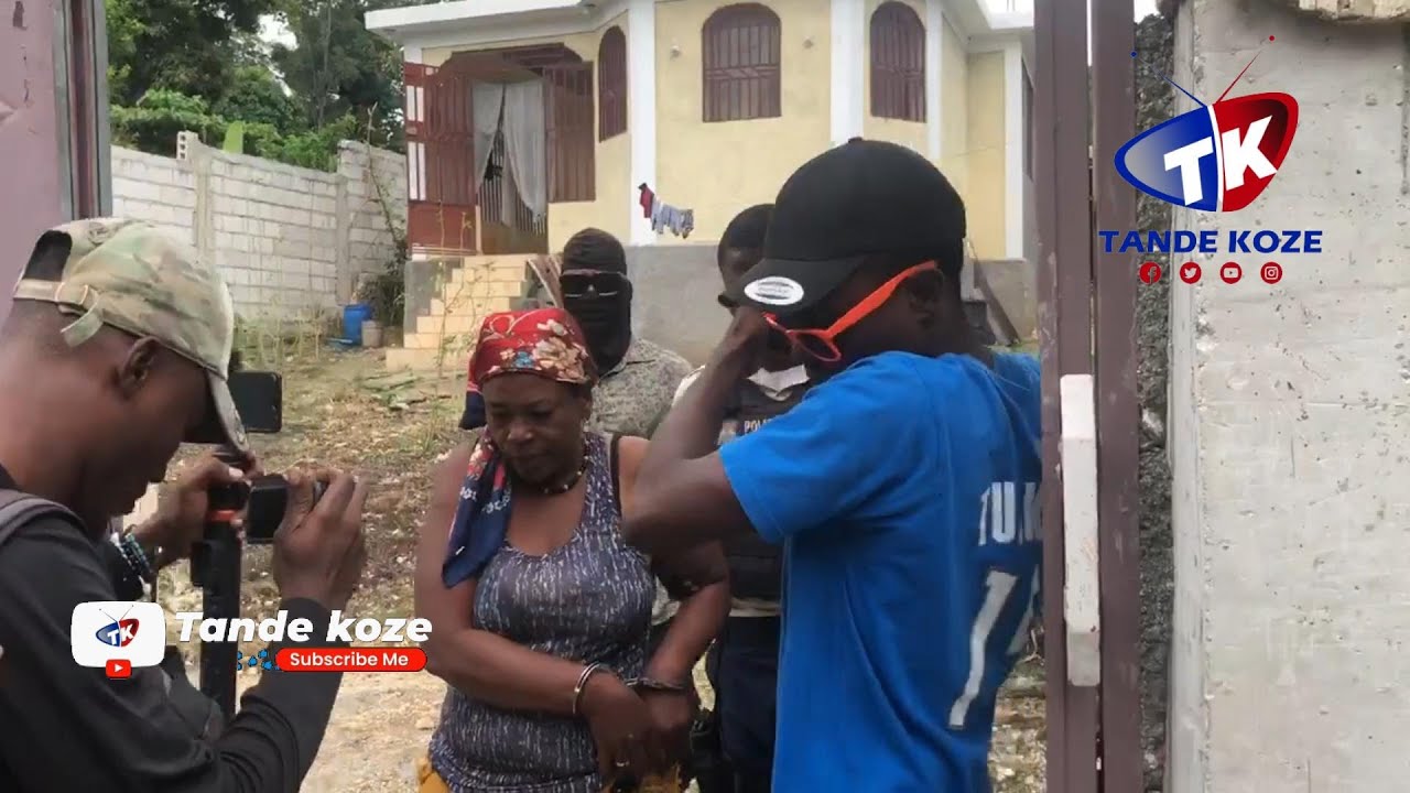 Komisè Exama frape Ti lapli fò, komisè mete anba kòd yon bwa dwat Tilapli.. Men tout detay yo!