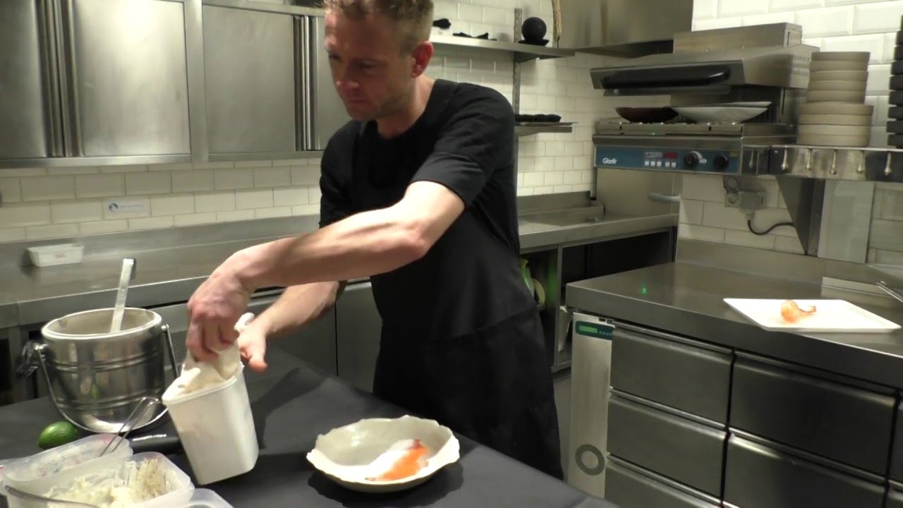 Jan Tournier prepares a dessert with carrots at the Michelin star Cuchara in Belgium
