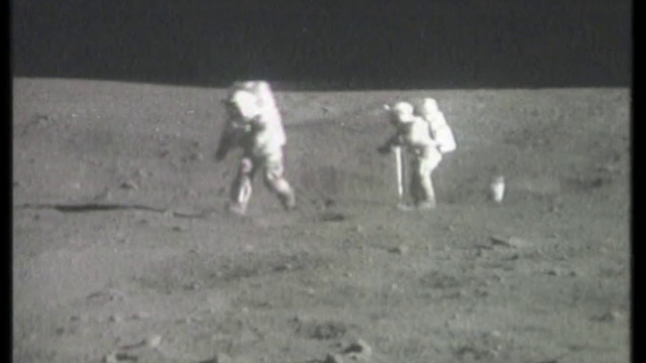 Astronaut Takes Giant Leap During Moonwalk, Juggles a Moon Rock