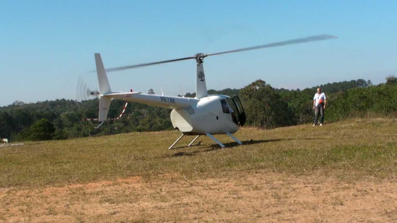 Helicóptero Robinson R44 II no Gaba arujá (saindo para voo)