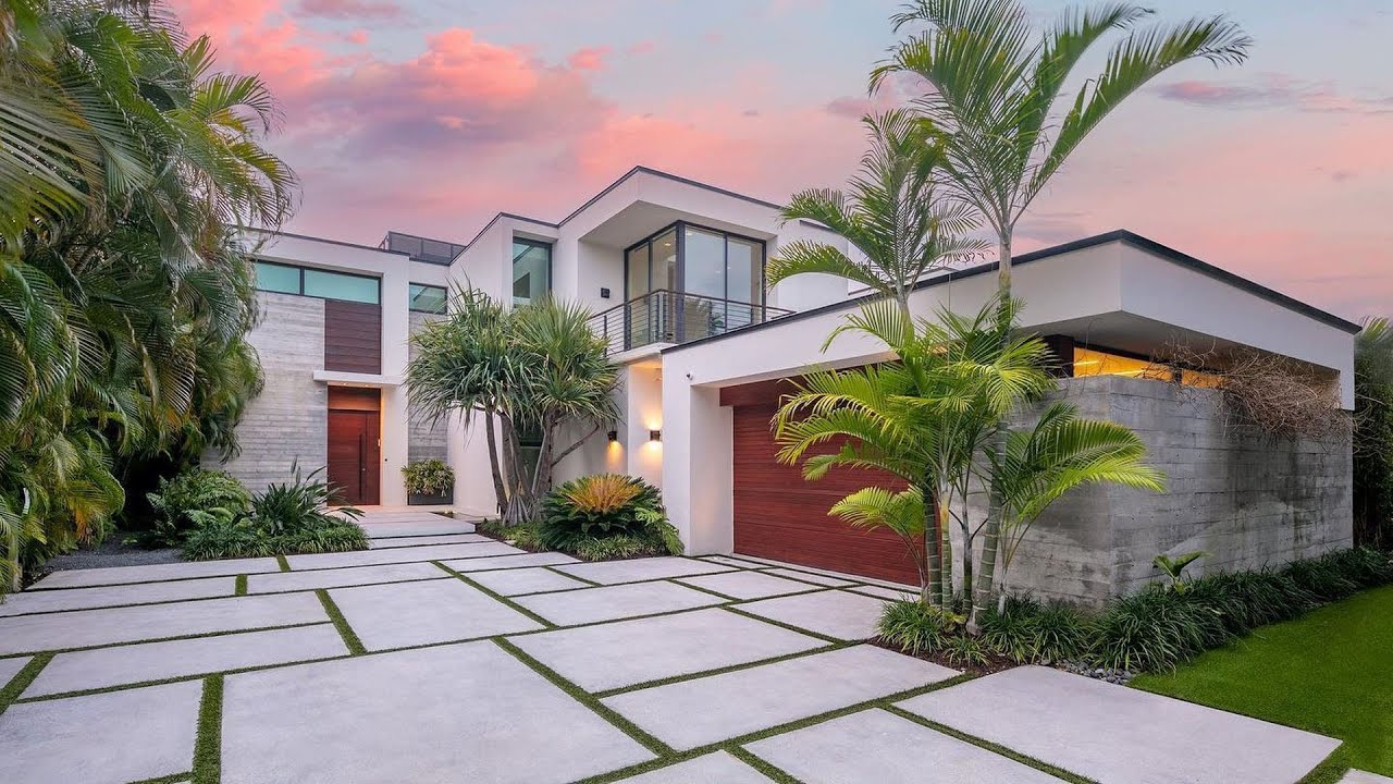 Asking $13M! This sleek Miami Beach home is an entertainer's dream with a gorgeous outdoor area