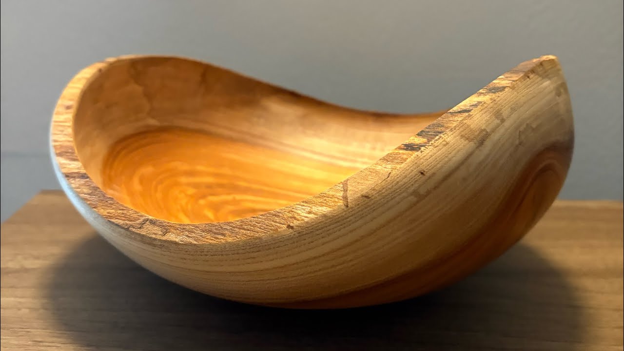 Lloyd Moyer turns a natural edge bowl