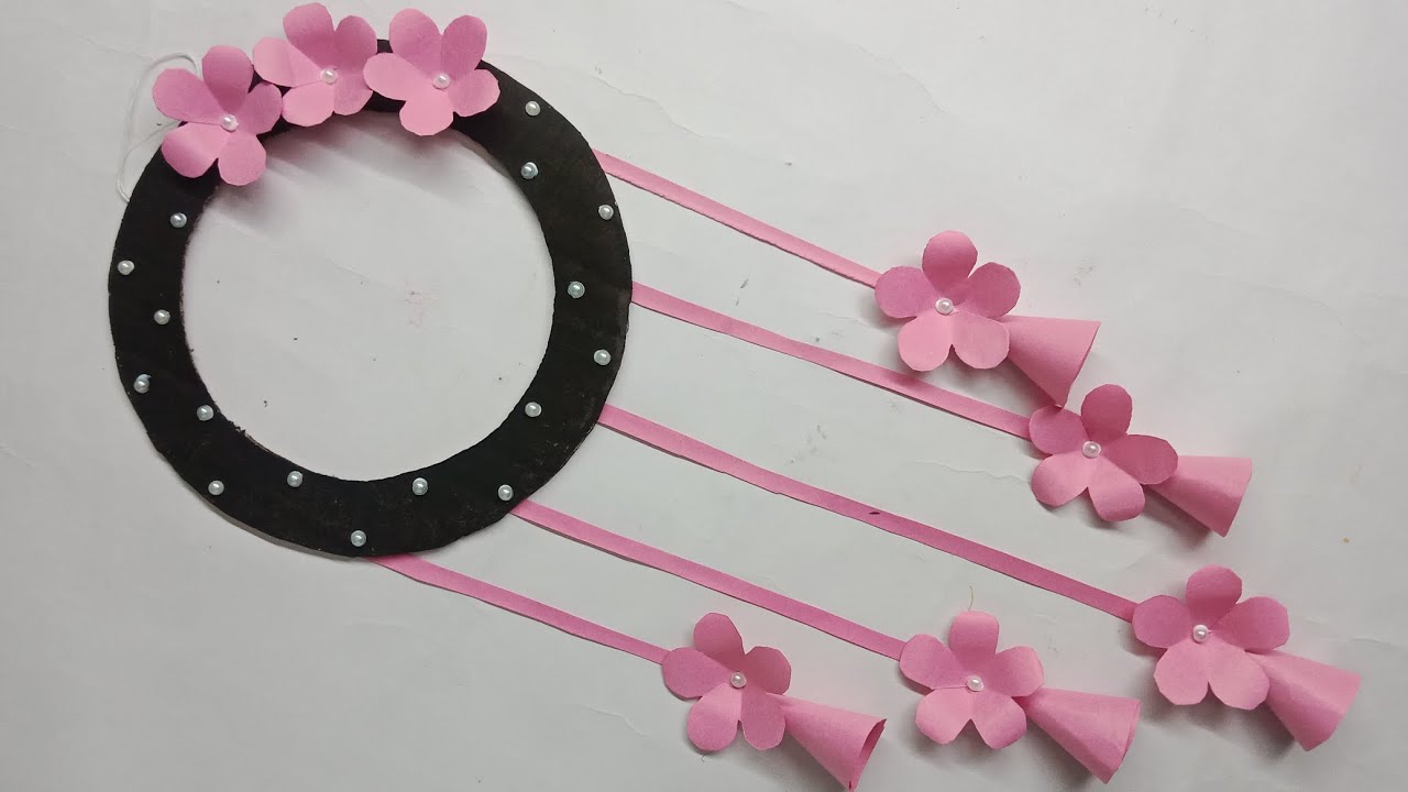Beautiful paper wall hanging #diy #homedecor #shortsfeed #craft #wallhangingcraftdecor