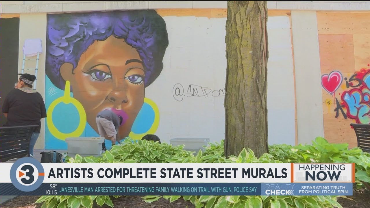 Artists complete murals and artwork on Downtown Madison storefronts