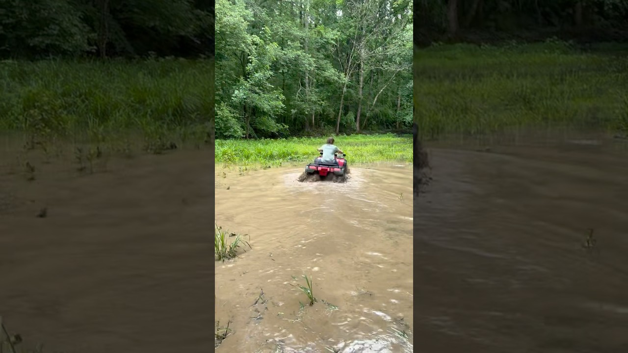 Mudering on a Honda Trax 300 4 x 4