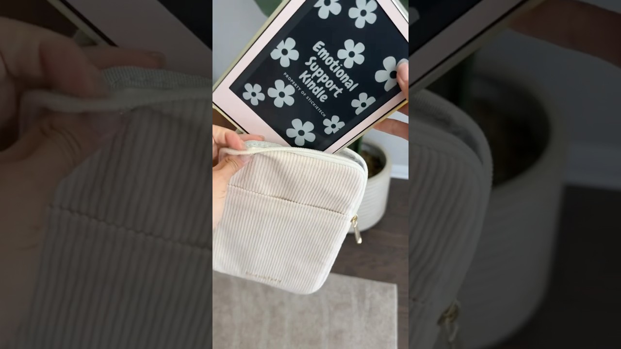 Kindle paperwhite with skin, clear case and popsocket on and it still fits into the kindle sleeve
