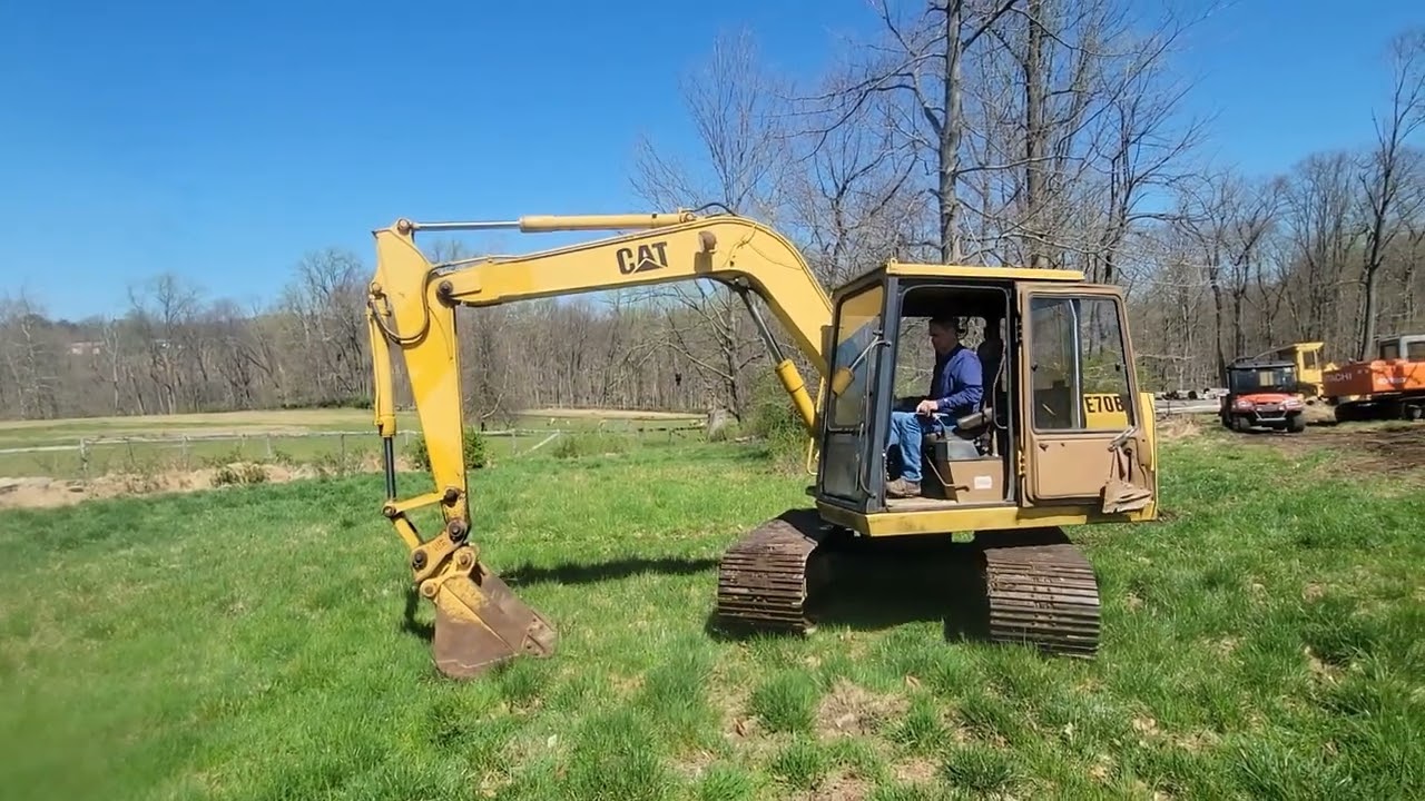 CAT E70B EXCAVATOR - Still Purrin' Strong and for Sale!