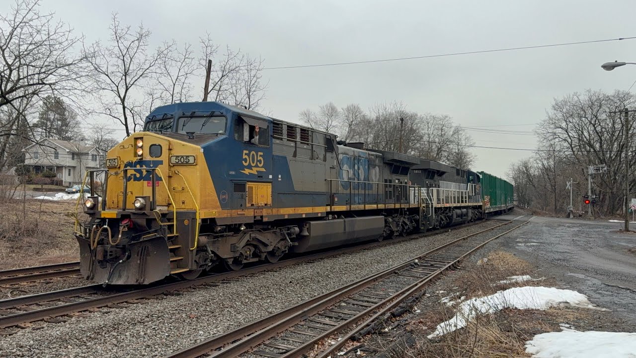 CSX 505 YN2 CW44AC leads CSX M301 with CSX 1853 NYC heritage trailing with a friendly crew at MP29