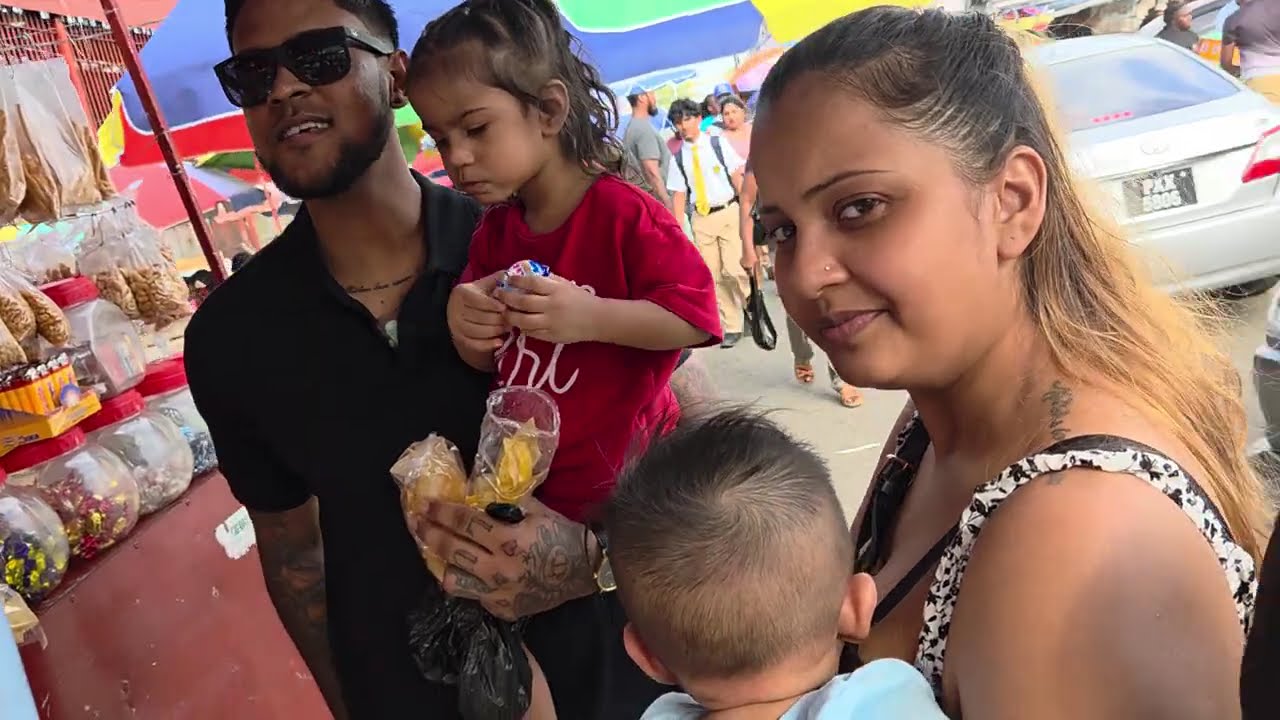 Visiting stabroek market reaching up  friends