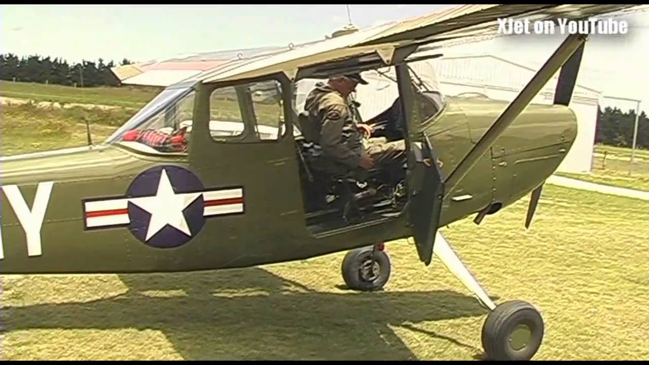 A full-sized Cessna Bird Dog visits the airfield