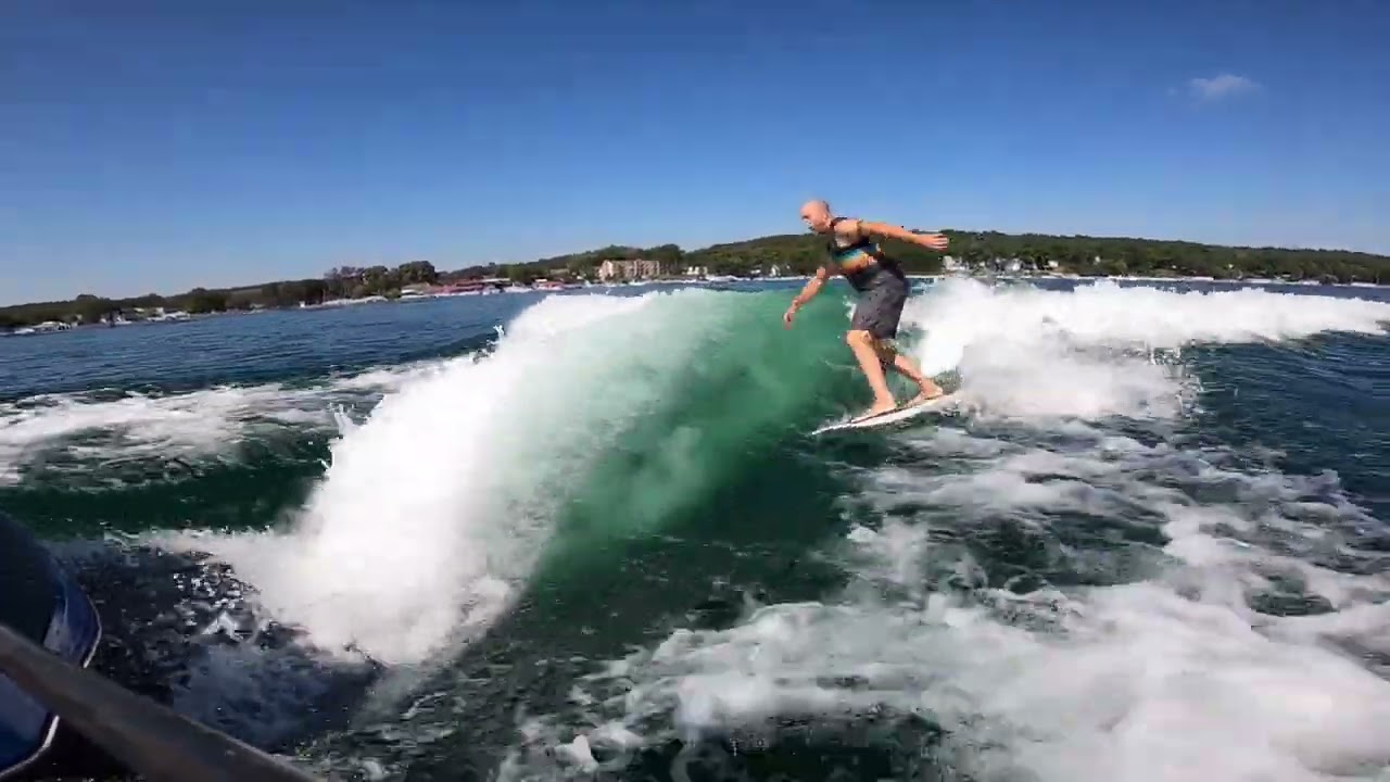 Geneva Lake Wake Surfing behind MB Sports F24 Tomcat Summer 2022