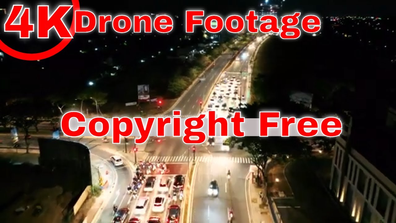 4K Drone Footage Of Vehicle Traffic Of Intersecting City Streets At Nighttime | Copyright Free