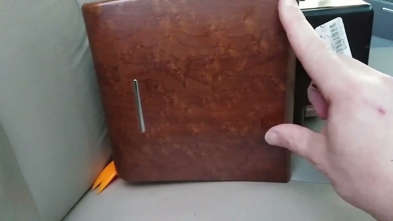 Replacing the center storage cubby in a 2008 Nissan Altima