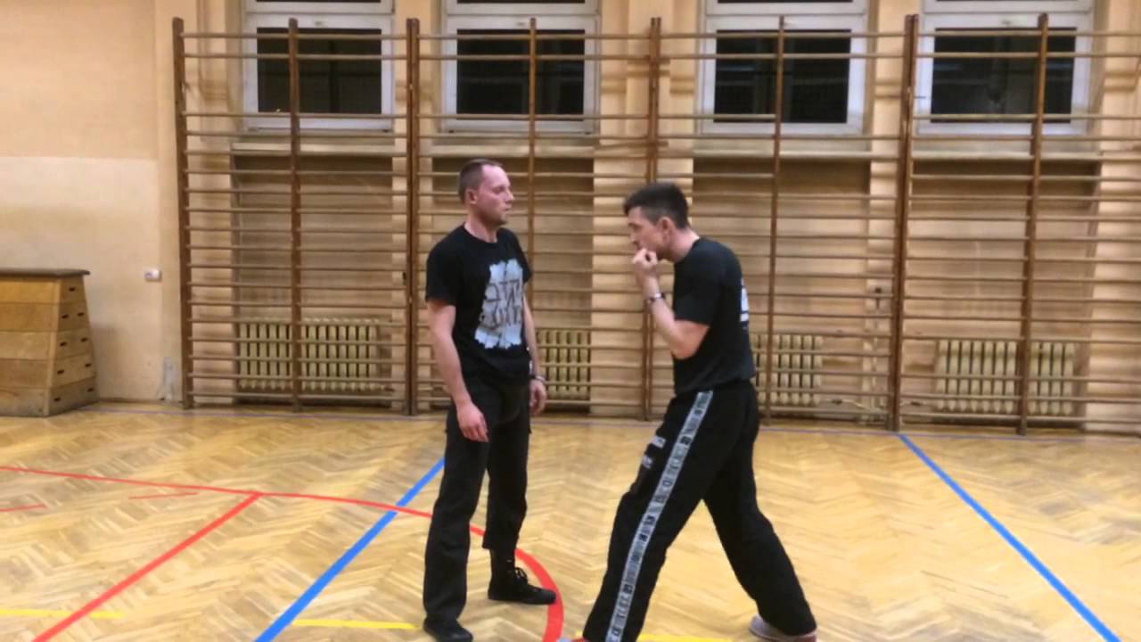 Mateusz Sog defenses against combination of hands attack. www.tribekravmaga.pl