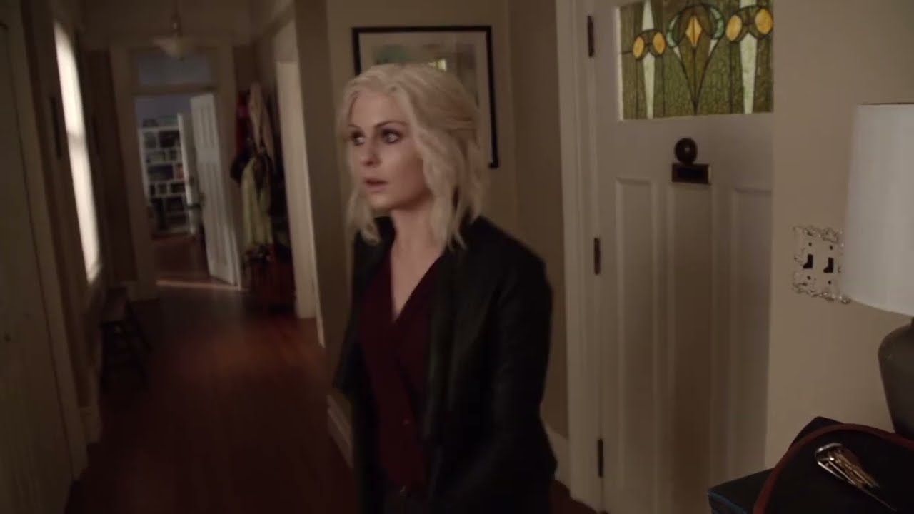 Rose McIver takes her boot off wearing black socks