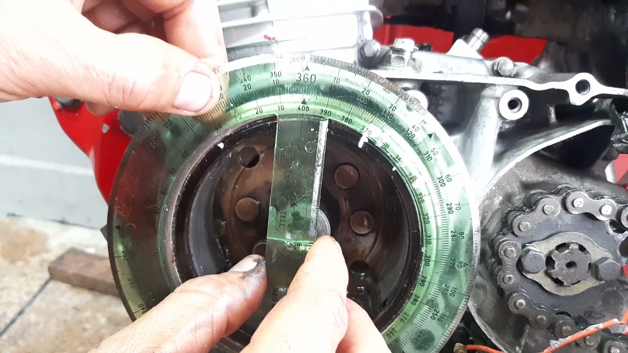 colocando a punto a XL185 con bobina d encendido incorporado de ax 100 y que de toda su potencia