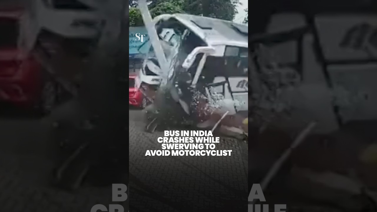 Terrifying moment bus crashes after swerving to avoid motorcycle collision in Kerala, India