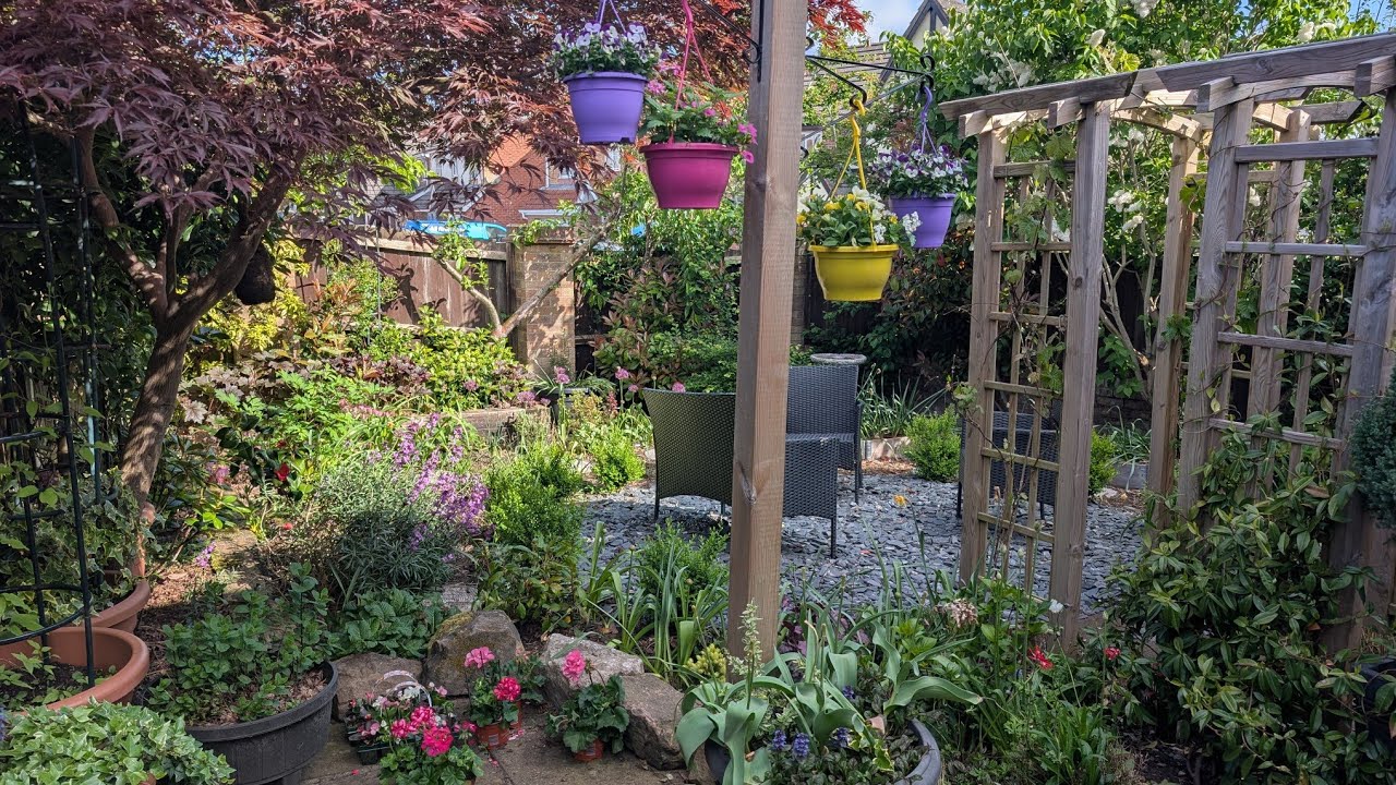 Early May garden Tour/ Tulips, Lilac and spring blooms in full beauty/ Small home garden tour in UK