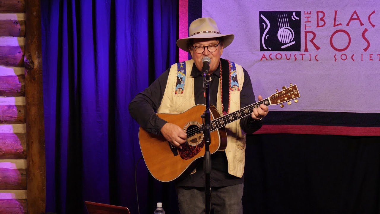 Jim Salestrom performs “Meeting John Denver” at The Black Rose Acoustic Society