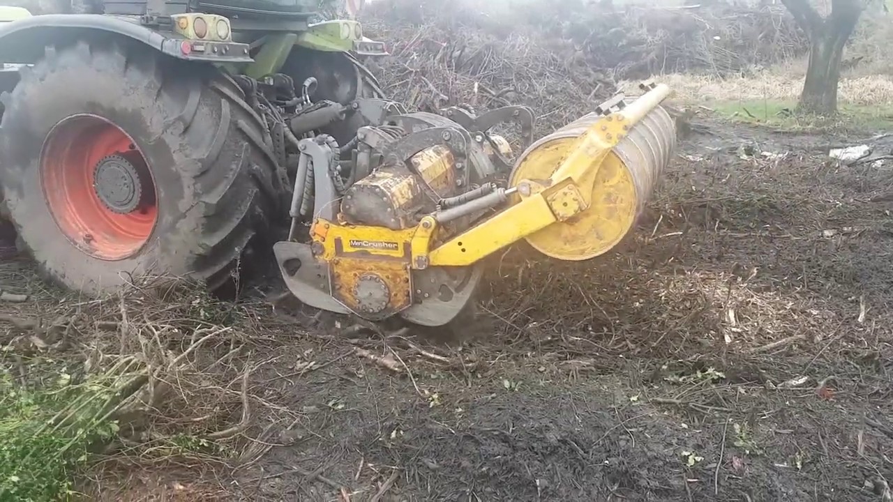 PTO-Mulcher and Rotovator MeriCrusher MJHS-241 STX mulching and crushing organic material stockpiles