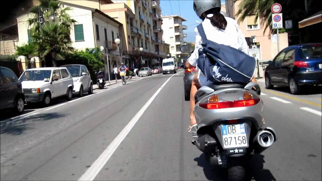 Ordinary swedish scooter driving in Italy