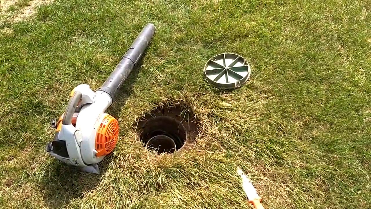 Removing Dirt from Irrigation Valve Utility Boxes