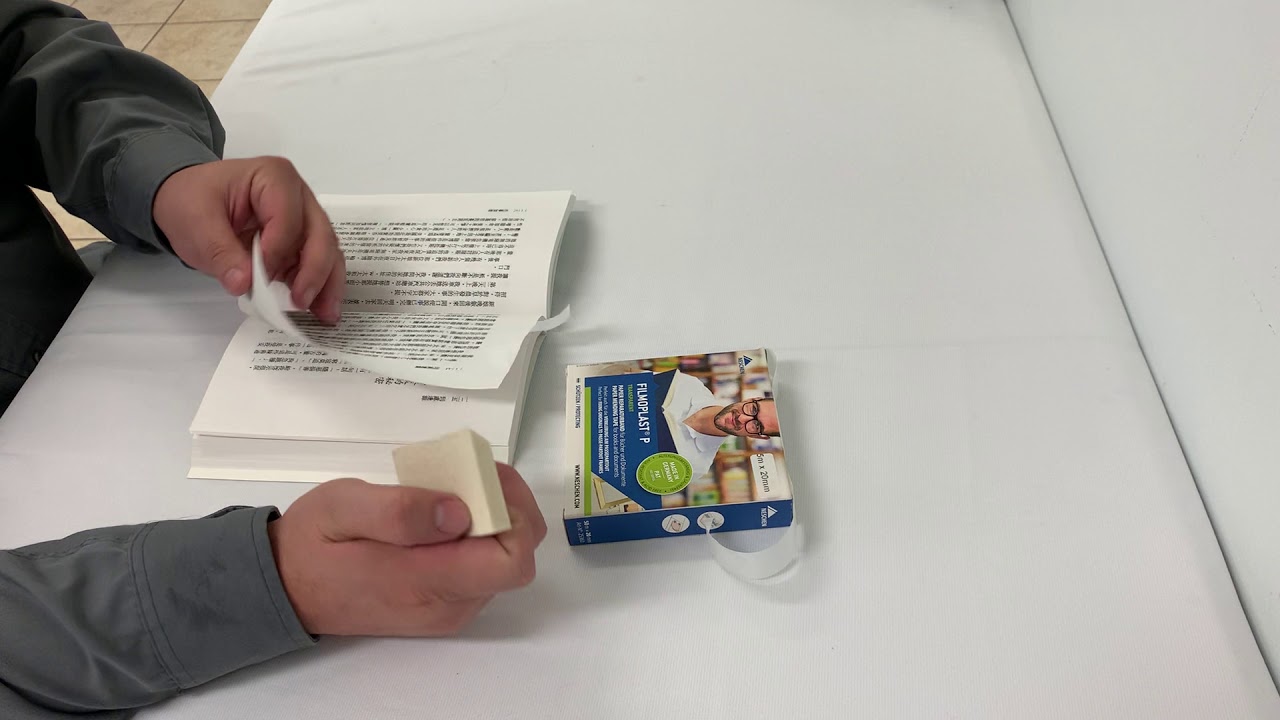 How to repair torn pages using Filmoplast P