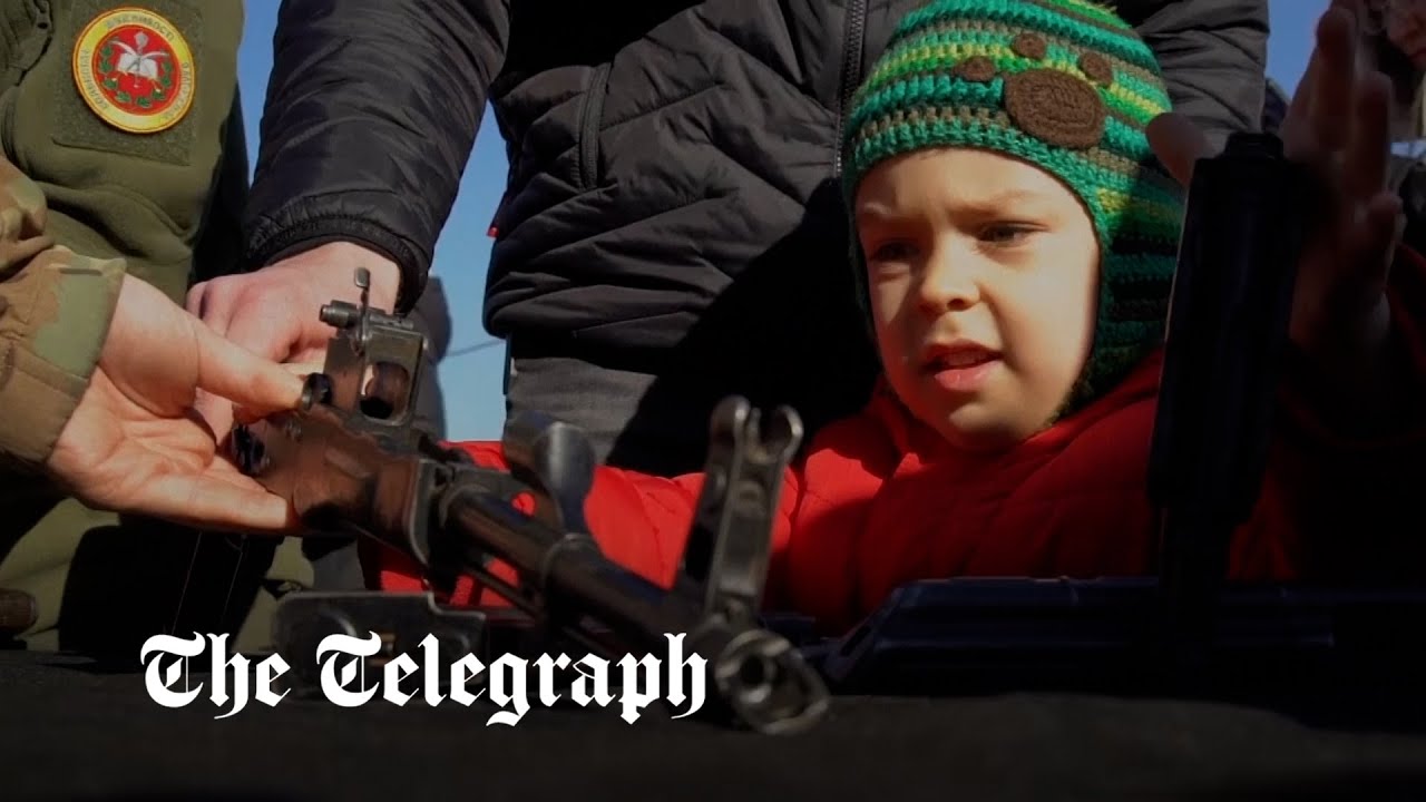 Ukraine: Children train with guns amid fears of Russian invasion