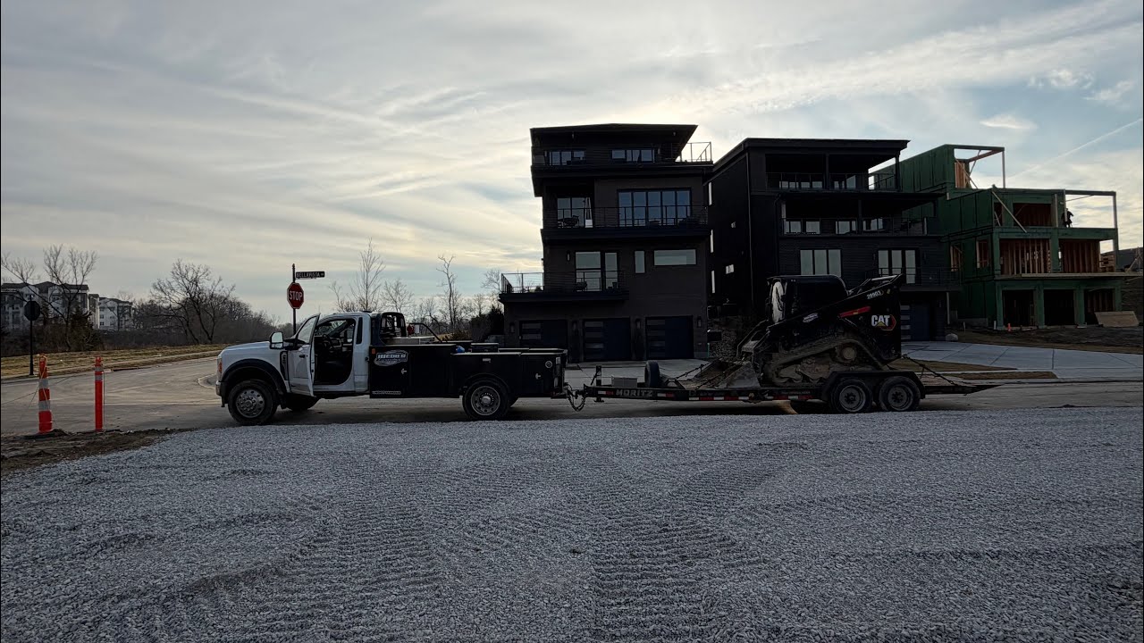 Putting in temporary driveways for houses overlooking Cincinnati