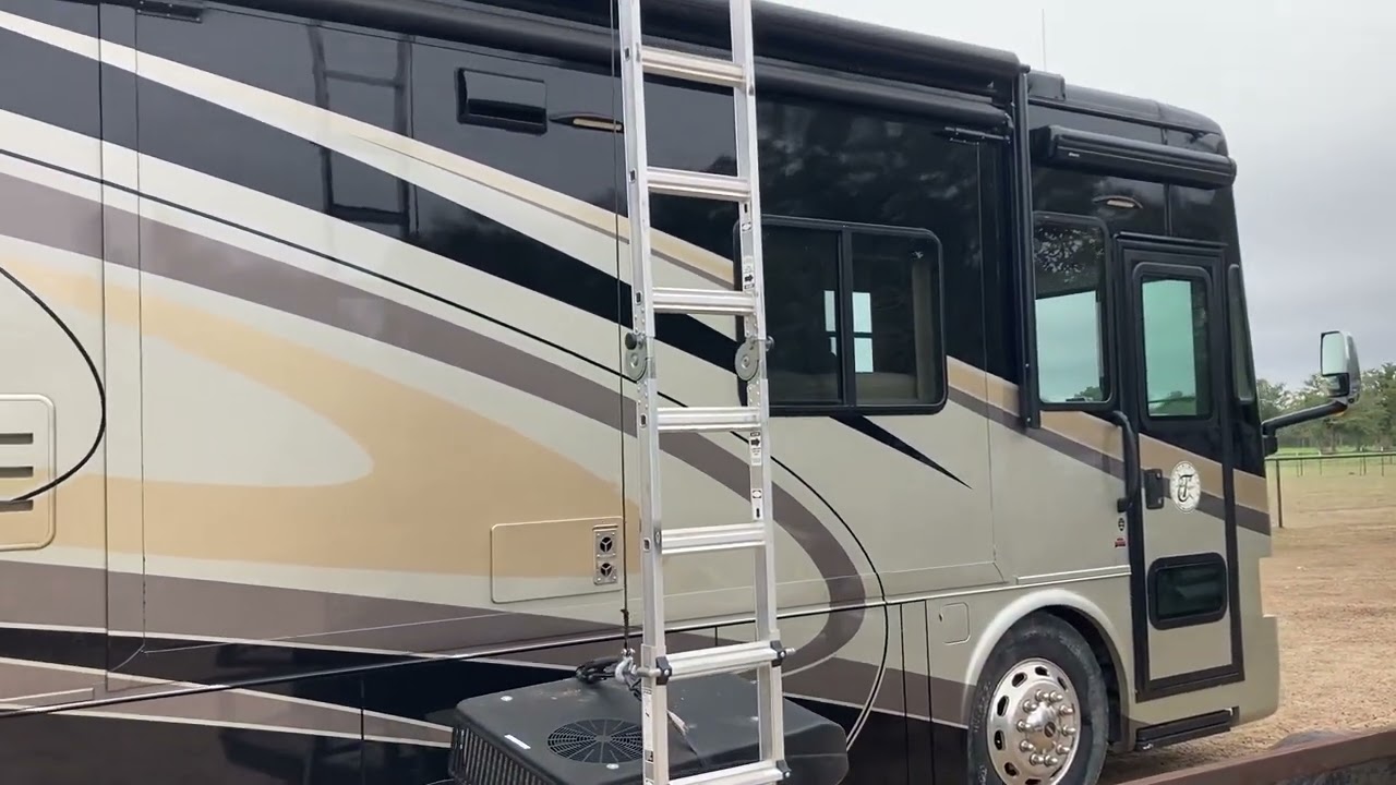 How to lift an air conditioner on to an RV in the field.
