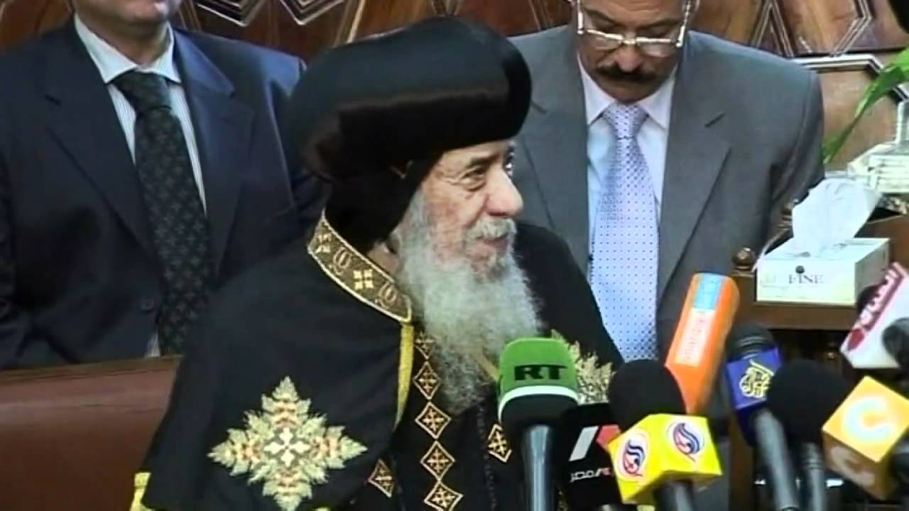 Egypt's Coptic Pope Shenouda III sits in state ahead of funeral
