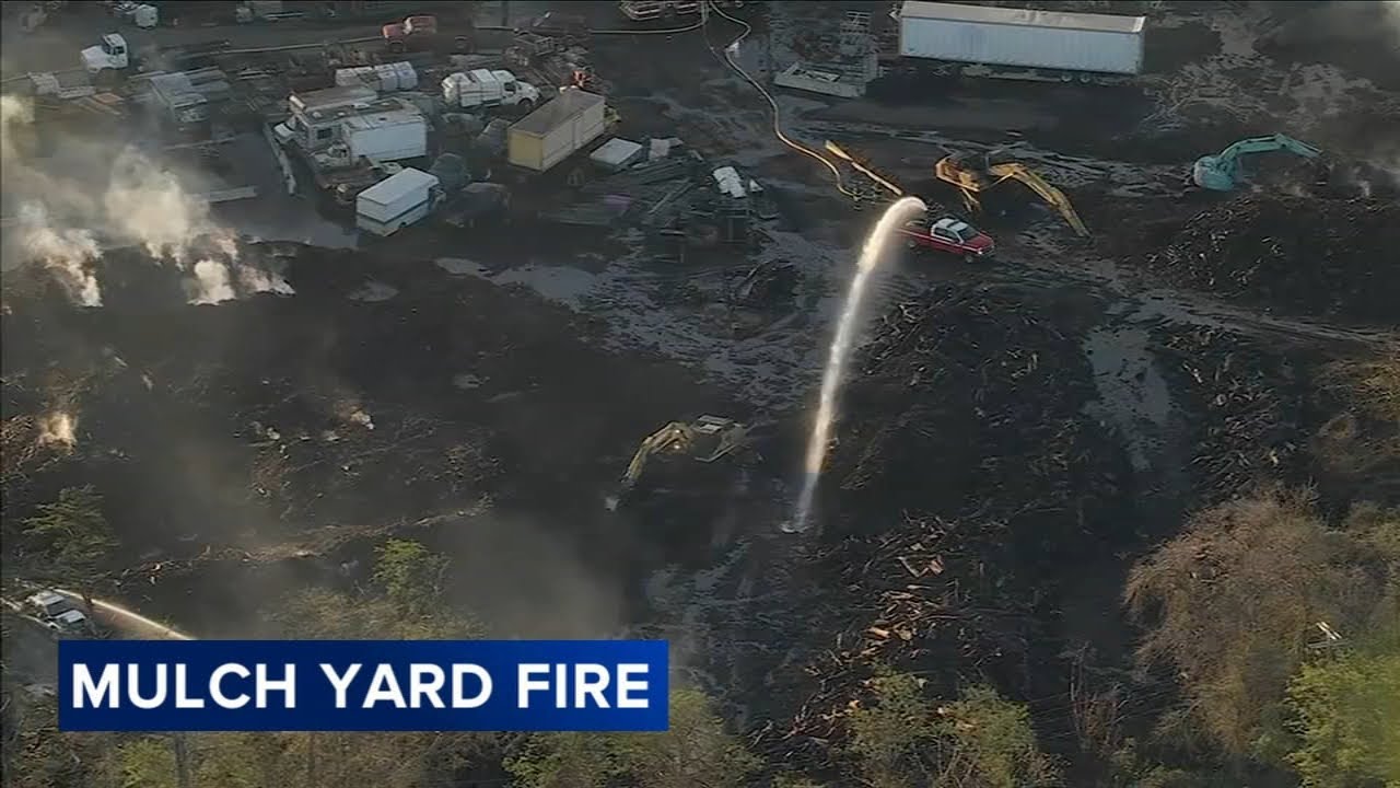 Mulch yard fire continues to burn in Atco, NJ
