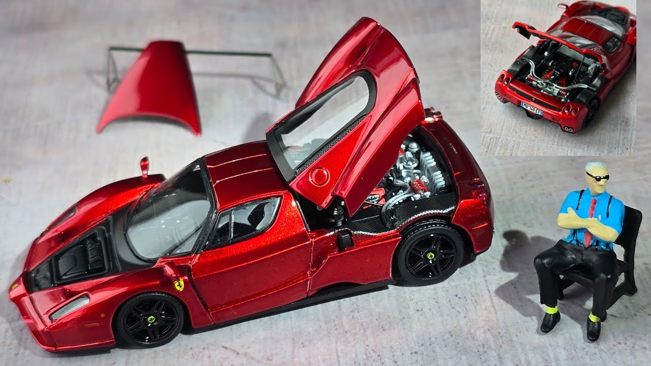 Литой Ferrari Enzo с открывающимися деталями и фигуркой мистера Энцо. Масштаб 1/64. Модель King.
