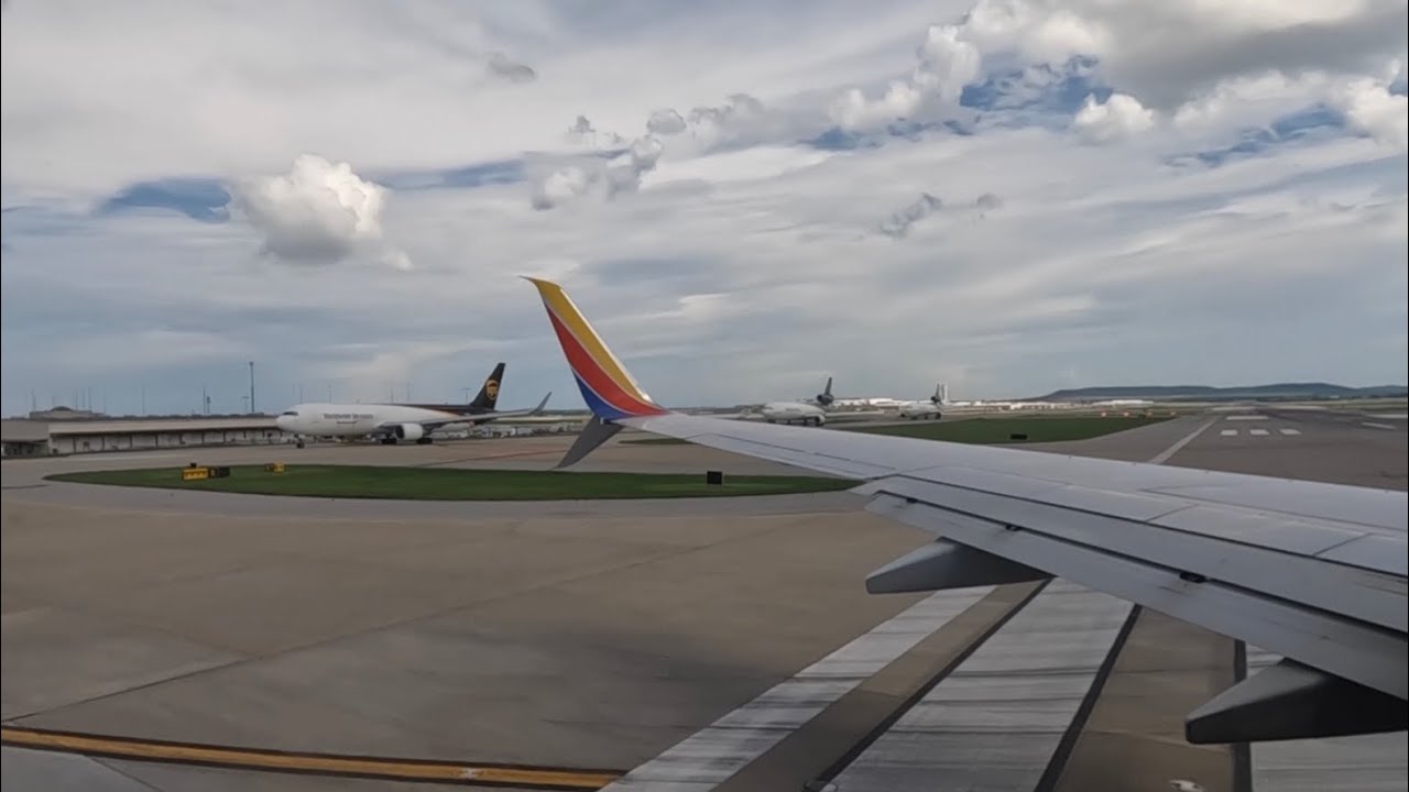 Southwest 737-8H4 pushback, taxi, and takeoff out of busy Louisville Kentucky