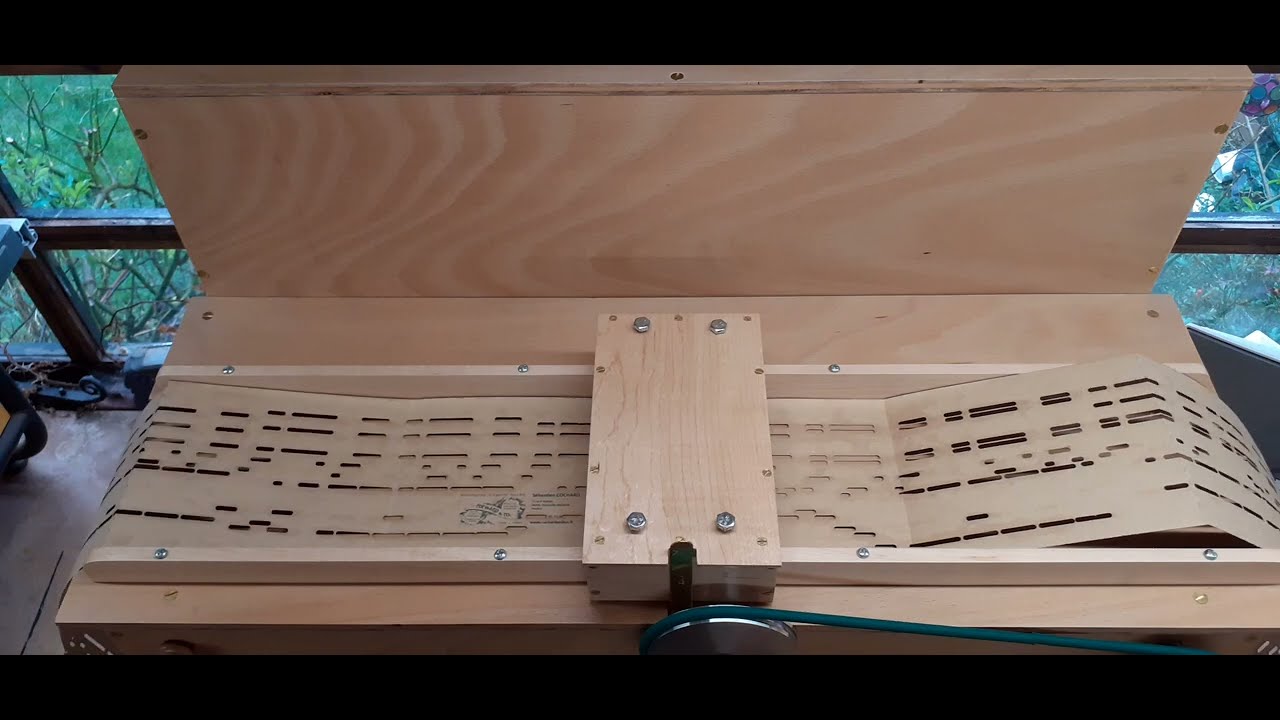 New 29 note book playing hand cranked street organ by Rob Barker Organs. Video 5 of 7.