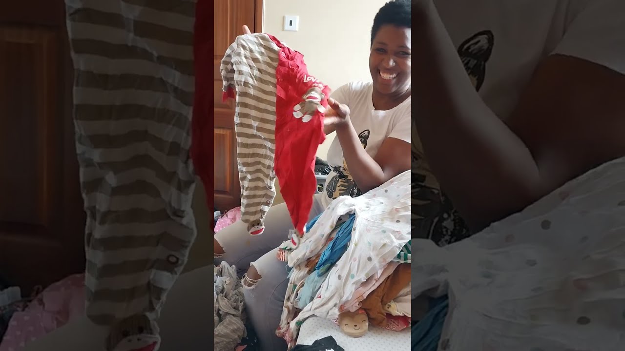 Opening mtumba bale (Baby Rompers)