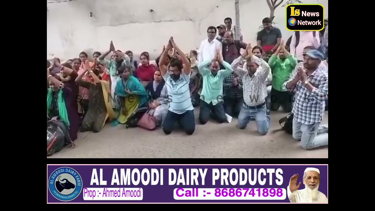 Gurukula teacher candidates who are protesting standing on their knees in front of Revanth Reddy'