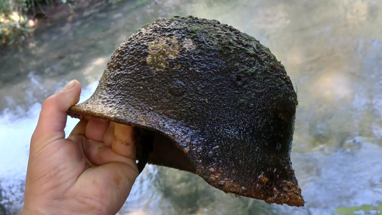 militaria sortie rivière,  festival de casques ww1 ww2 . casque allemand