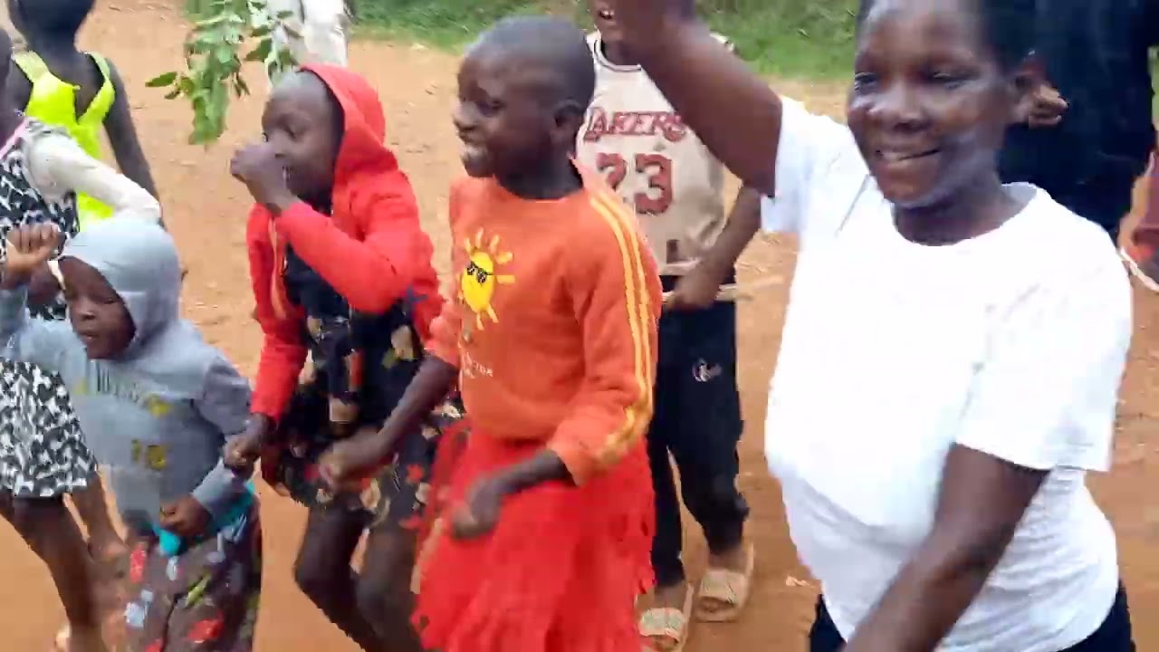 Worshipping and praising God deep in the village doing evangelism 