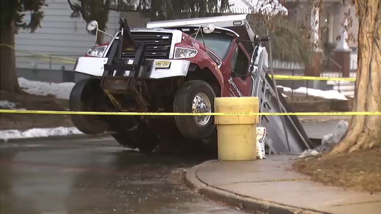 Sinkhole swallows dump truck in Phillipsburg, New Jersey