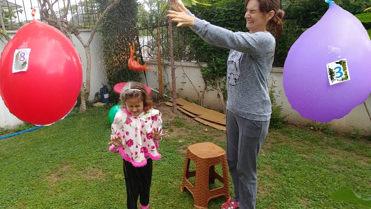 Kafada içleri sürpriz  dolu balon patlatmaca , eğlenceli challenge videosu